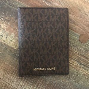 New, never used Michael Kors Passport Holder